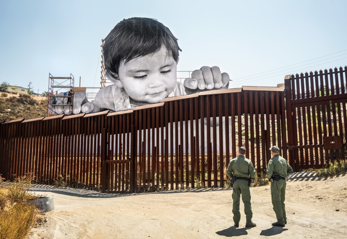 JR (French, born 1983). GIANTS, Kikito and the Boarder Patrol, Tecate, Mexico—U.S.A., 2017.